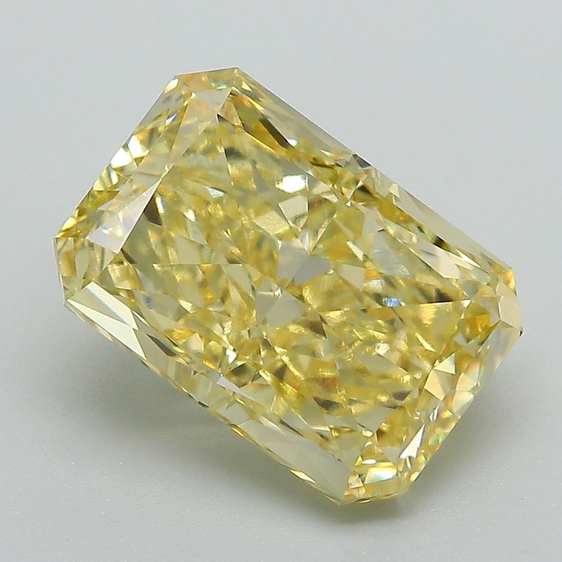 Loose Diamond - RADIANT 5.73ct Fancy Vivid Yellow VVS2: Loose Diamond - RADIANT 5.73ct Fancy Vivid Yellow VVS2 Source: This is a real non-mined Diamond that has been grown in a lab Shape: RADIANT Carats: 5.73 Color: Fancy Vivid Yellow Certification: IGI Vi