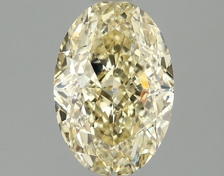Loose Diamond - OVAL 1.59ct Fancy Intense Yellow VS2: Loose Diamond - OVAL 1.59ct Fancy Intense Yellow VS2 Source: This is a real non-mined Diamond that has been grown in a lab Shape: OVAL Carats: 1.59 Color: Fancy Intense Yellow Certification: IGI Video