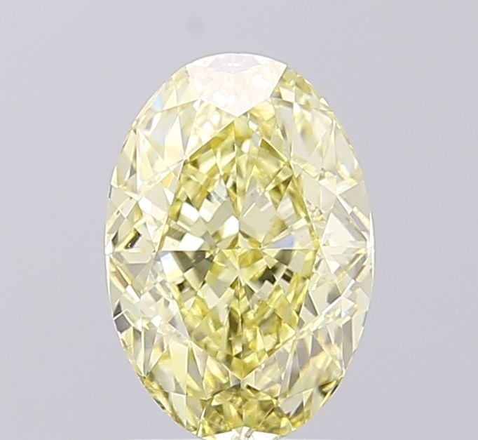 Loose Diamond - OVAL 2.1ct Fancy Yellow VS1: Loose Diamond - OVAL 2.1ct Fancy Yellow VS1 Source: This is a real non-mined Diamond that has been grown in a lab Shape: OVAL Carats: 2.1 Color: Fancy Yellow Certification: IGI Video: