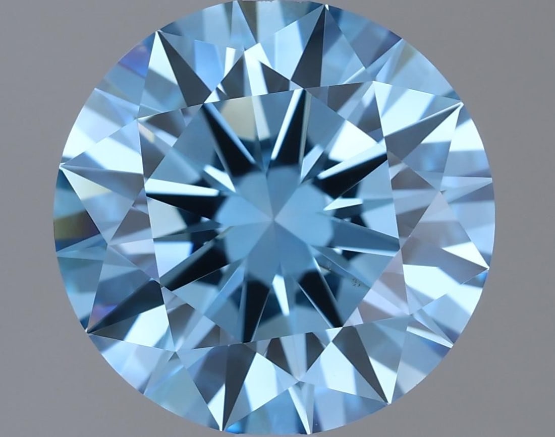 Loose Diamond - ROUND 2.05ct Fancy Vivid Blue VVS1: Loose Diamond - ROUND 2.05ct Fancy Vivid Blue VVS1 Source: This is a real non-mined Diamond that has been grown in a lab Shape: ROUND Carats: 2.05 Color: Fancy Vivid Blue Certification: IGI Video: