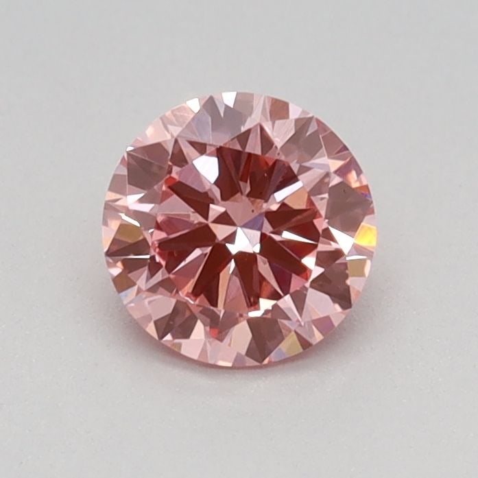 Loose Diamond - ROUND 0.44ct Fancy Vivid Pink VS1: Loose Diamond - ROUND 0.44ct Fancy Vivid Pink VS1 Source: This is a real non-mined Diamond that has been grown in a lab Shape: ROUND Carats: 0.44 Color: Fancy Vivid Pink Certification: IGI Video: