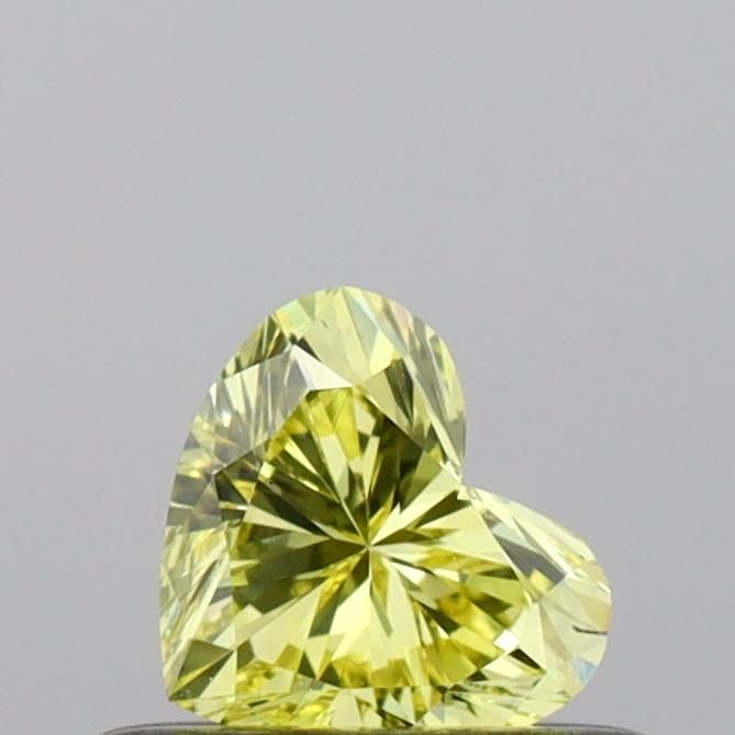 Loose Diamond - HEART 0.32ct Fancy Vivid Yellow VS2: Loose Diamond - HEART 0.32ct Fancy Vivid Yellow VS2 Source: This is a real non-mined Diamond that has been grown in a lab Shape: HEART Carats: 0.32 Color: Fancy Vivid Yellow Certification: IGI Video: