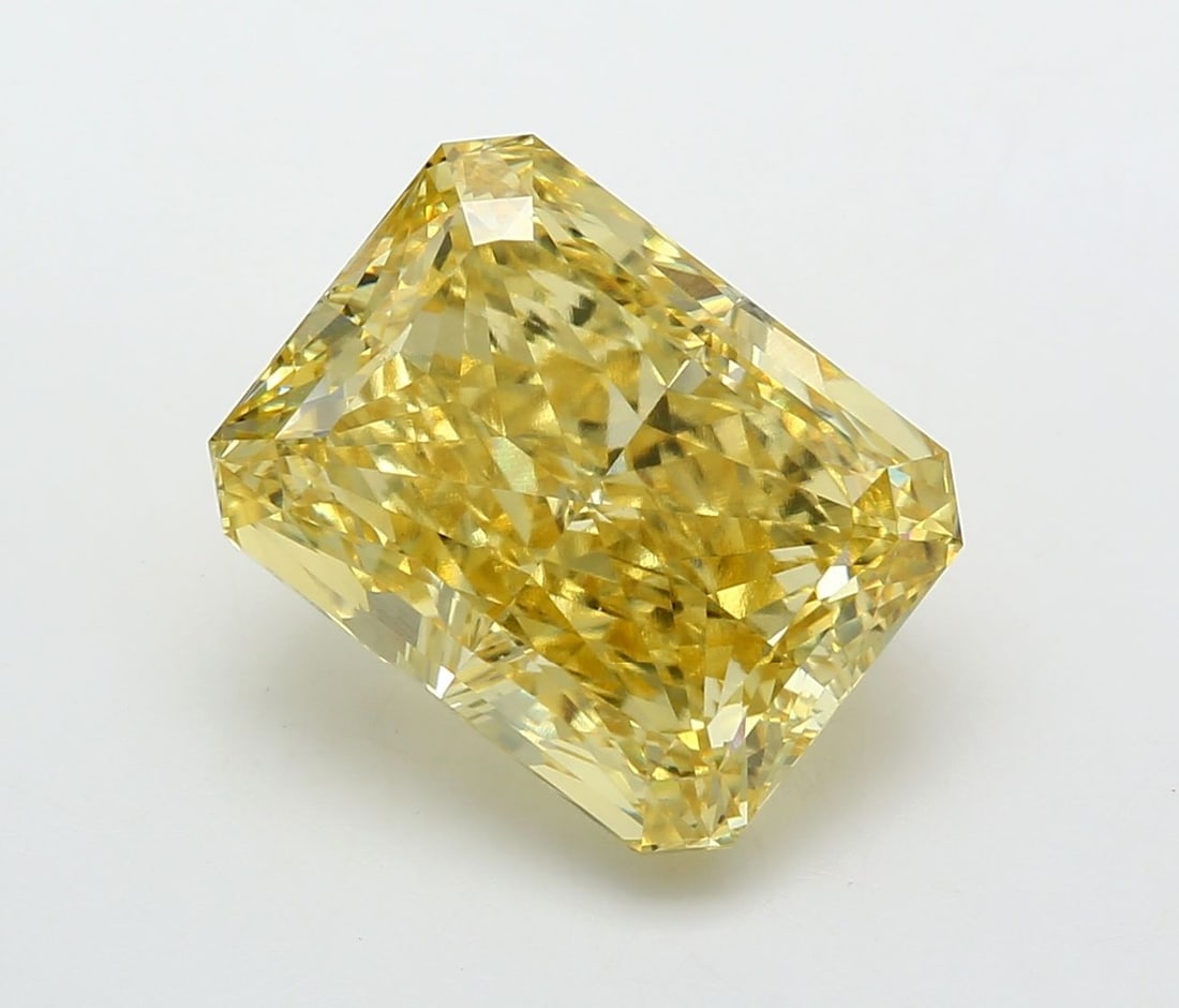 Loose Diamond - RADIANT 10.18ct Fancy Vivid Yellow VVS2: Loose Diamond - RADIANT 10.18ct Fancy Vivid Yellow VVS2 Source: This is a real non-mined Diamond that has been grown in a lab Shape: RADIANT Carats: 10.18 Color: Fancy Vivid Yellow Certification: IGI 
