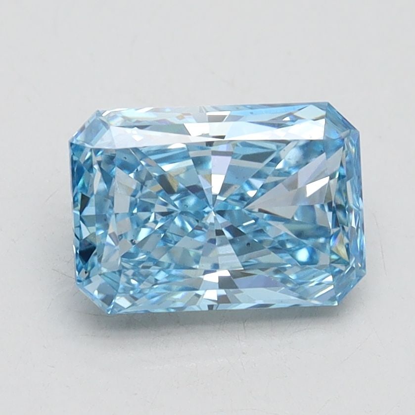 Loose Diamond - RADIANT 1.48ct Fancy Vivid Blue SI1: Loose Diamond - RADIANT 1.48ct Fancy Vivid Blue SI1 Source: This is a real non-mined Diamond that has been grown in a lab Shape: RADIANT Carats: 1.48 Color: Fancy Vivid Blue Certification: IGI Video: