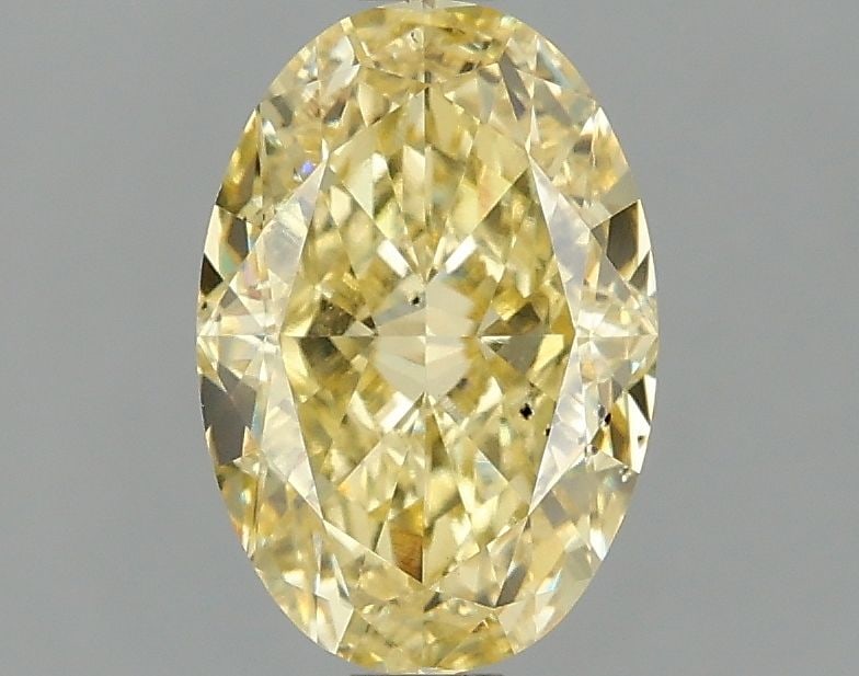 Loose Diamond - OVAL 2.04ct Fancy Vivid Yellow SI1: Loose Diamond - OVAL 2.04ct Fancy Vivid Yellow SI1 Source: This is a real non-mined Diamond that has been grown in a lab Shape: OVAL Carats: 2.04 Color: Fancy Vivid Yellow Certification: IGI Video: