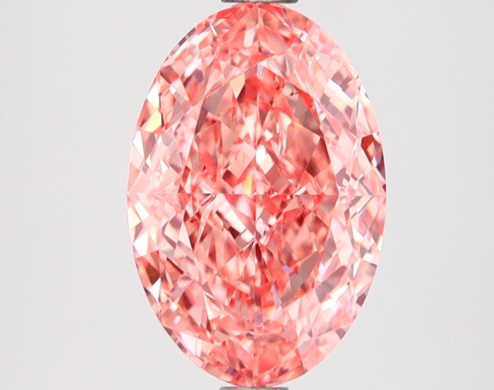 Loose Diamond - OVAL 2.55ct Fancy Vivid Pink VS1: Loose Diamond - OVAL 2.55ct Fancy Vivid Pink VS1 Source: This is a real non-mined Diamond that has been grown in a lab Shape: OVAL Carats: 2.55 Color: Fancy Vivid Pink Certification: IGI Video:
