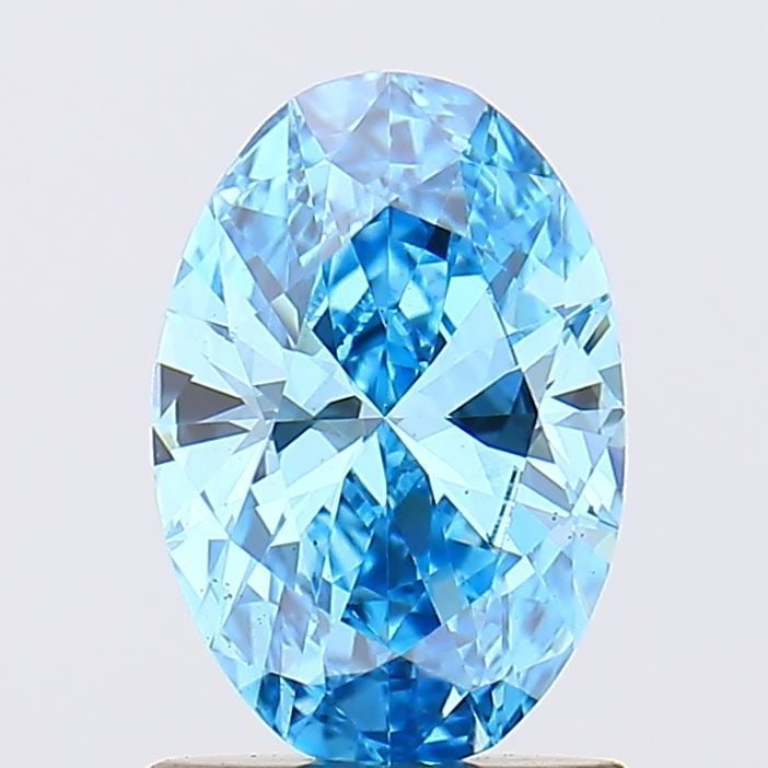 Loose Diamond - OVAL 1.0ct Fancy Vivid Blue VS1: Loose Diamond - OVAL 1.0ct Fancy Vivid Blue VS1 Source: This is a real non-mined Diamond that has been grown in a lab Shape: OVAL Carats: 1.0 Color: Fancy Vivid Blue Certification: IGI Video:
