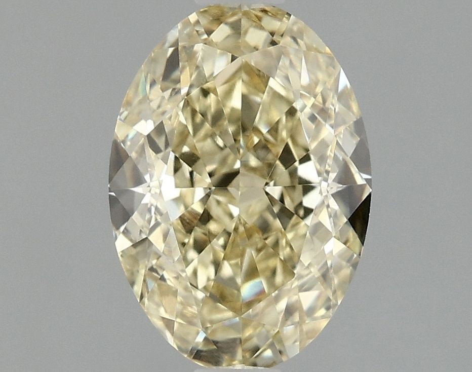 Loose Diamond - OVAL 1.46ct Fancy Yellow VS1: Loose Diamond - OVAL 1.46ct Fancy Yellow VS1 Source: This is a real non-mined Diamond that has been grown in a lab Shape: OVAL Carats: 1.46 Color: Fancy Yellow Certification: IGI Video: