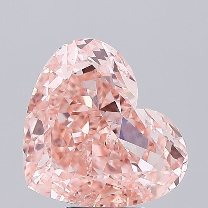 Loose Diamond - HEART 7.02ct Fancy Vivid Pink VS1: Loose Diamond - HEART 7.02ct Fancy Vivid Pink VS1 Source: This is a real non-mined Diamond that has been grown in a lab Shape: HEART Carats: 7.02 Color: Fancy Vivid Pink Certification: IGI Video: