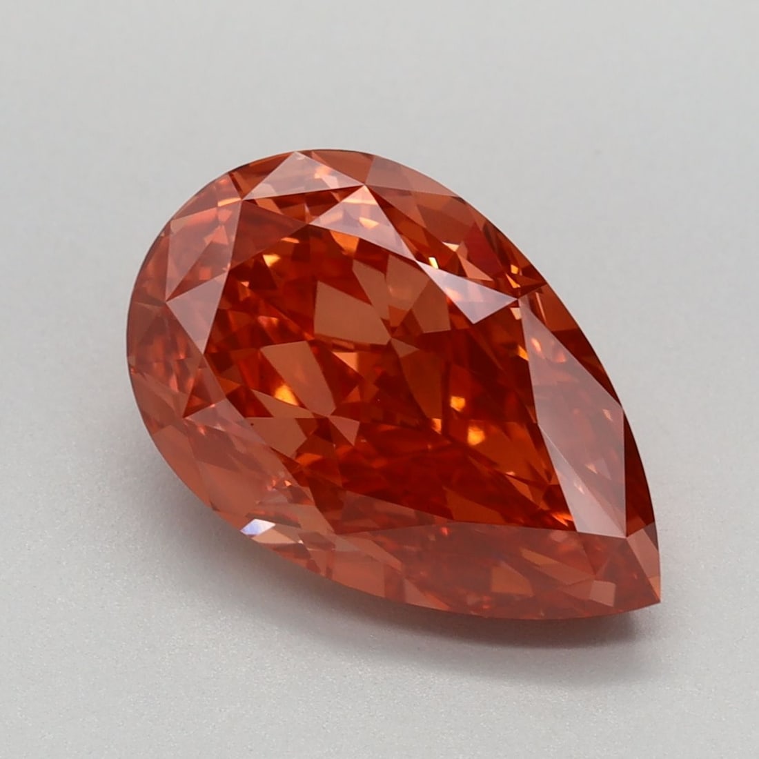 Loose Diamond - PEAR 3.31ct Fancy Vivid Orangey Pink VS1: Loose Diamond - PEAR 3.31ct Fancy Vivid Orangey Pink VS1 Source: This is a real non-mined Diamond that has been grown in a lab Shape: PEAR Carats: 3.31 Color: Fancy Vivid Orangey Pink Certification: I