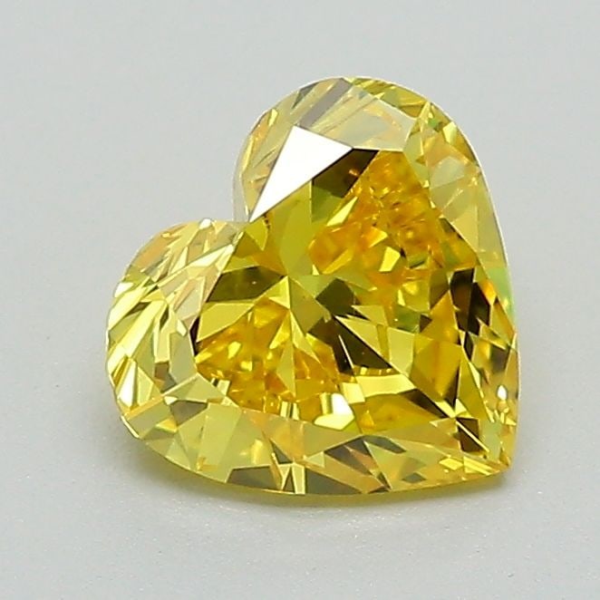 Loose Diamond - HEART 1.01ct Fancy Vivid Yellow VS2: Loose Diamond - HEART 1.01ct Fancy Vivid Yellow VS2 Source: This is a real non-mined Diamond that has been grown in a lab Shape: HEART Carats: 1.01 Color: Fancy Vivid Yellow Certification: IGI Video: