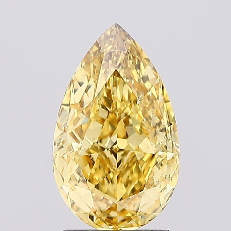 Loose Diamond - PEAR 2.0ct Fancy Vivid Yellow VS2: Loose Diamond - PEAR 2.0ct Fancy Vivid Yellow VS2 Source: This is a real non-mined Diamond that has been grown in a lab Shape: PEAR Carats: 2.0 Color: Fancy Vivid Yellow Certification: IGI Video: