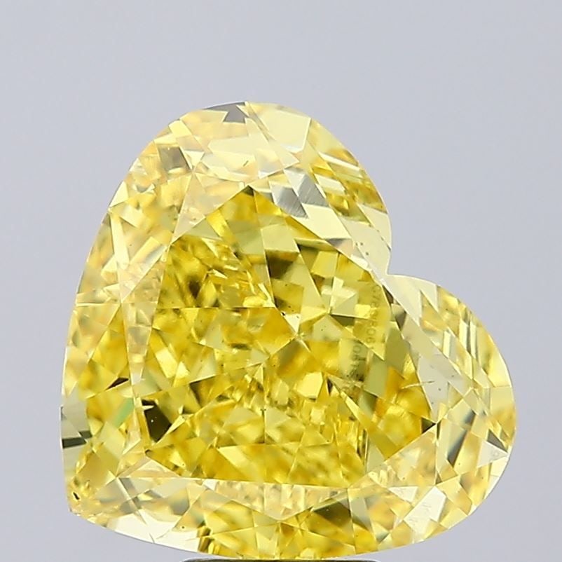 Loose Diamond - HEART 10.09ct Fancy Vivid Yellow VS2: Loose Diamond - HEART 10.09ct Fancy Vivid Yellow VS2 Source: This is a real non-mined Diamond that has been grown in a lab Shape: HEART Carats: 10.09 Color: Fancy Vivid Yellow Certification: IGI Video