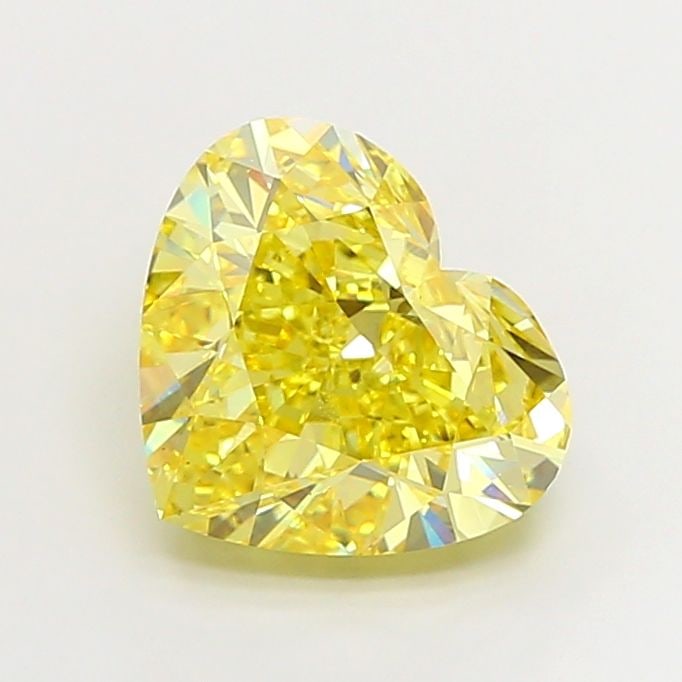 Loose Diamond - HEART 7.02ct Fancy Vivid Yellow VS1: Loose Diamond - HEART 7.02ct Fancy Vivid Yellow VS1 Source: This is a real non-mined Diamond that has been grown in a lab Shape: HEART Carats: 7.02 Color: Fancy Vivid Yellow Certification: IGI Video: