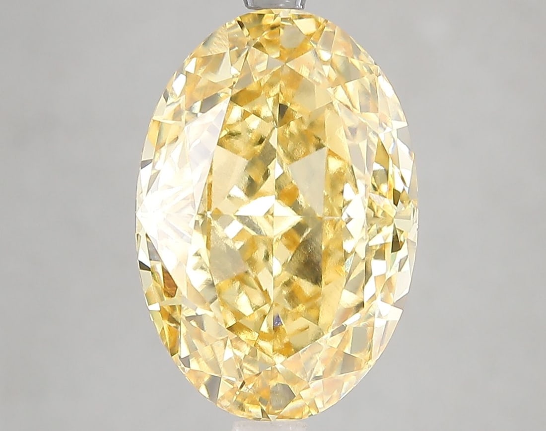 Loose Diamond - OVAL 7.19ct Fancy Intense Yellow VVS2: Loose Diamond - OVAL 7.19ct Fancy Intense Yellow VVS2 Source: This is a real non-mined Diamond that has been grown in a lab Shape: OVAL Carats: 7.19 Color: Fancy Intense Yellow Certification: IGI Vide