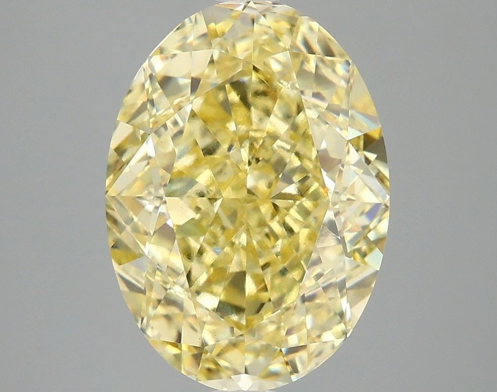 Loose Diamond - OVAL 4.05ct Fancy Vivid Yellow VS1: Loose Diamond - OVAL 4.05ct Fancy Vivid Yellow VS1 Source: This is a real non-mined Diamond that has been grown in a lab Shape: OVAL Carats: 4.05 Color: Fancy Vivid Yellow Certification: IGI Video: