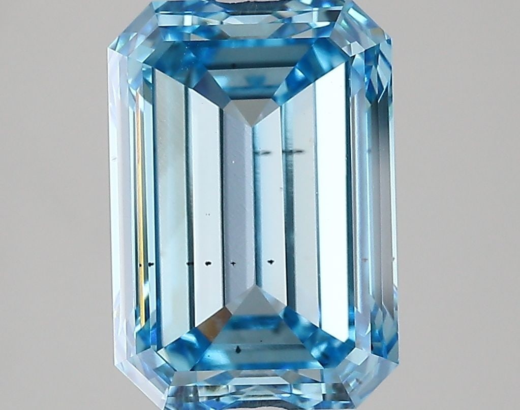 Loose Diamond - EMERALD 5.0ct Fancy Vivid Blue VS2: Loose Diamond - EMERALD 5.0ct Fancy Vivid Blue VS2 Source: This is a real non-mined Diamond that has been grown in a lab Shape: EMERALD Carats: 5.0 Color: Fancy Vivid Blue Certification: IGI Video: