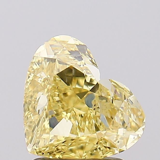 Loose Diamond - HEART 1.99ct Fancy Intense Yellow VS2: Loose Diamond - HEART 1.99ct Fancy Intense Yellow VS2 Source: This is a real non-mined Diamond that has been grown in a lab Shape: HEART Carats: 1.99 Color: Fancy Intense Yellow Certification: IGI Vid