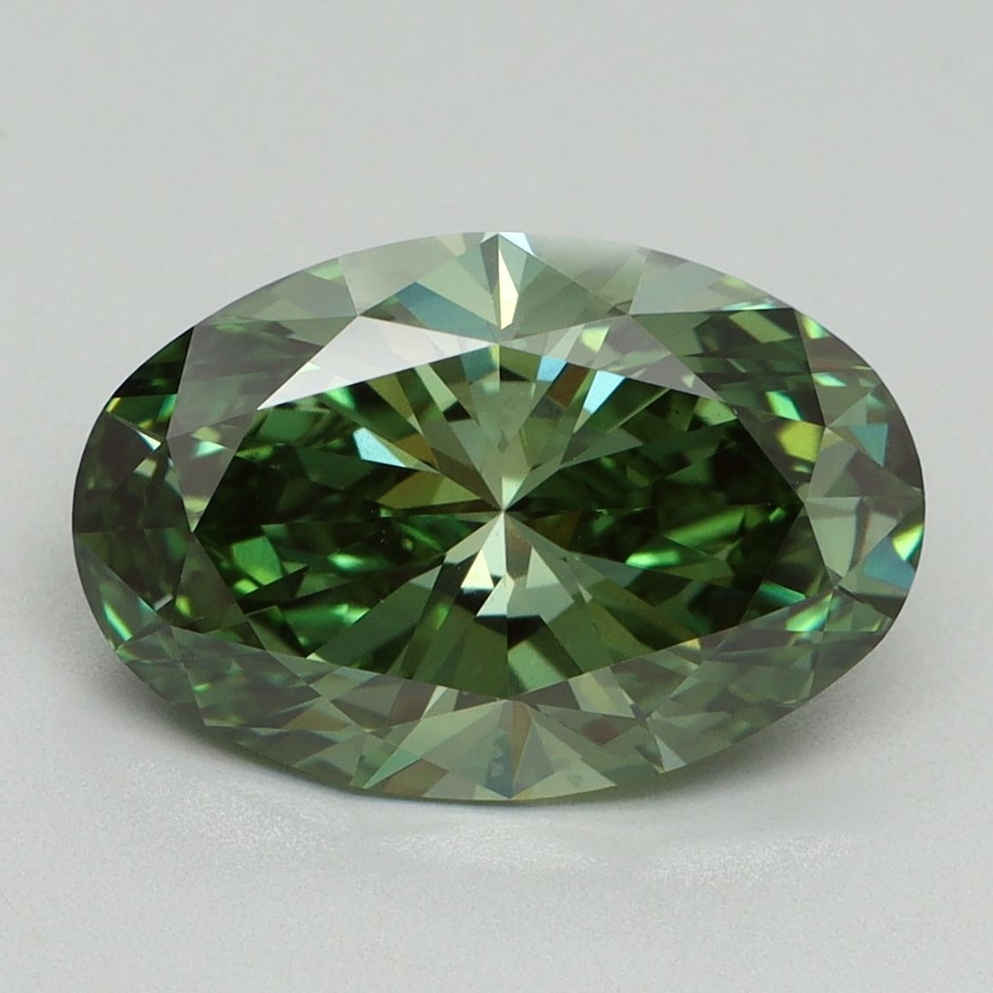 Loose Diamond - OVAL 4.1ct Fancy Vivid Green VS1: Loose Diamond - OVAL 4.1ct Fancy Vivid Green VS1 Source: This is a real non-mined Diamond that has been grown in a lab Shape: OVAL Carats: 4.1 Color: Fancy Vivid Green Certification: IGI Video: