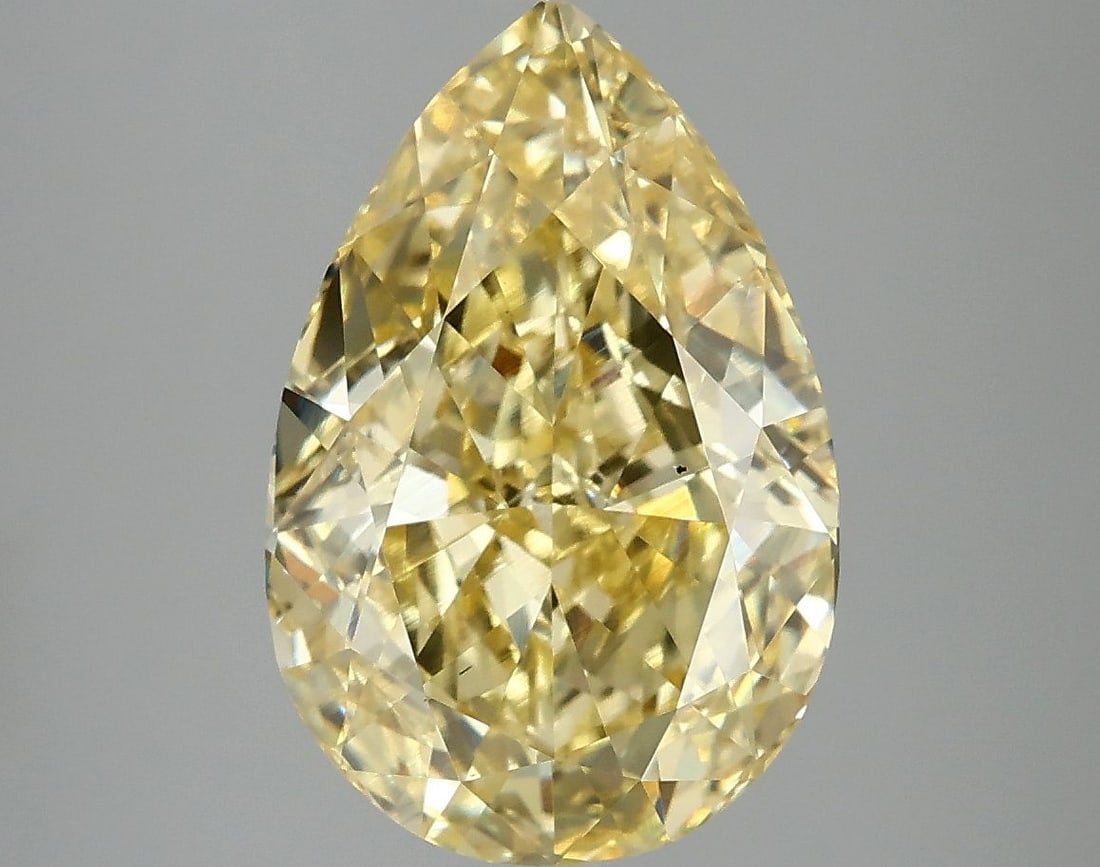 Loose Diamond - PEAR 5.06ct Fancy Vivid Yellow VS2: Loose Diamond - PEAR 5.06ct Fancy Vivid Yellow VS2 Source: This is a real non-mined Diamond that has been grown in a lab Shape: PEAR Carats: 5.06 Color: Fancy Vivid Yellow Certification: IGI Video:
