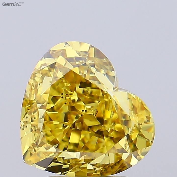 Loose Diamond - HEART 3.07ct Fancy Vivid Yellow VS2: Loose Diamond - HEART 3.07ct Fancy Vivid Yellow VS2 Source: This is a real non-mined Diamond that has been grown in a lab Shape: HEART Carats: 3.07 Color: Fancy Vivid Yellow Certification: IGI Video: