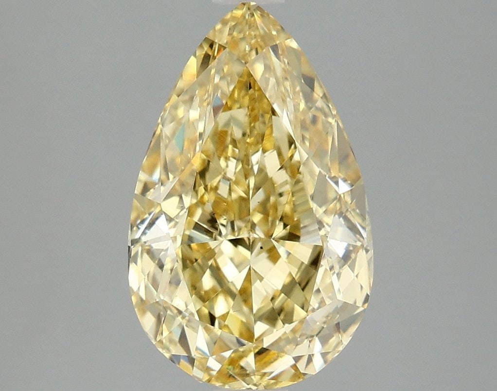 Loose Diamond - PEAR 3.07ct Fancy Vivid Yellow VS2: Loose Diamond - PEAR 3.07ct Fancy Vivid Yellow VS2 Source: This is a real non-mined Diamond that has been grown in a lab Shape: PEAR Carats: 3.07 Color: Fancy Vivid Yellow Certification: IGI Video: