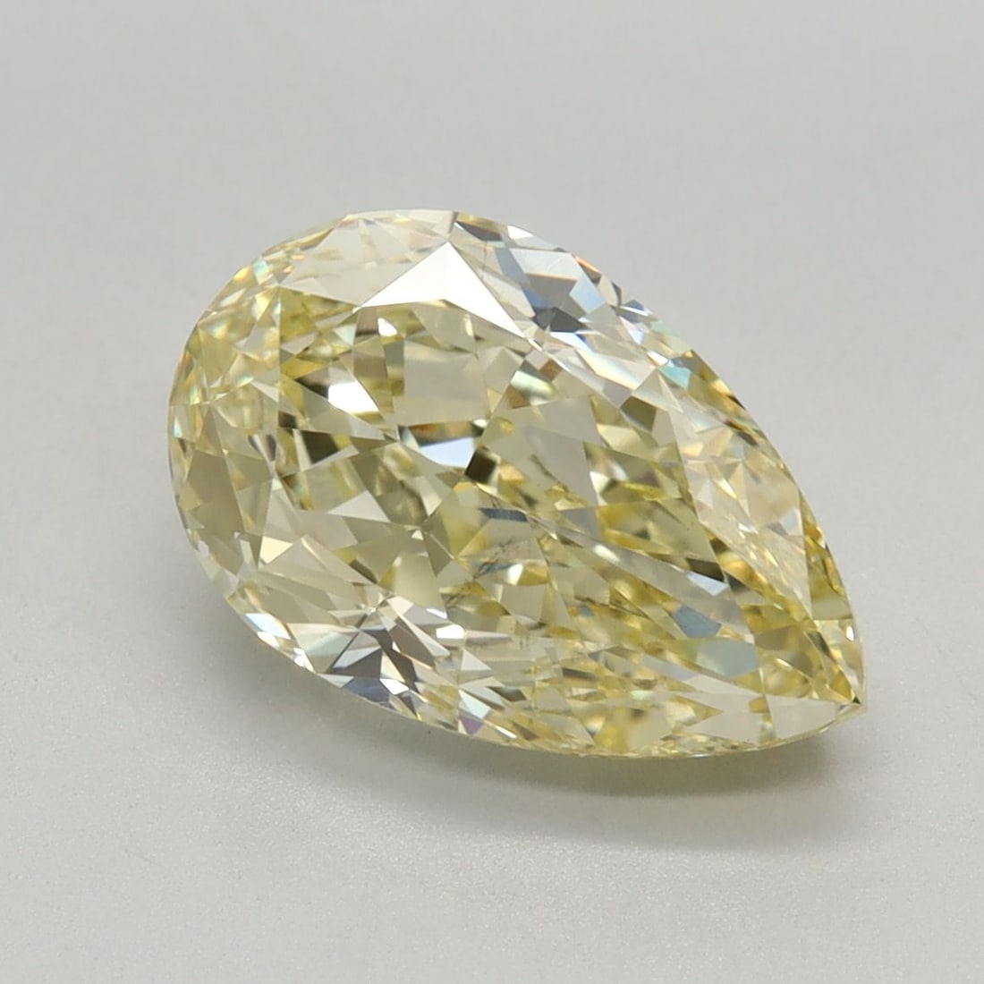 Loose Diamond - PEAR 2.64ct Fancy Light Yellow VS1: Loose Diamond - PEAR 2.64ct Fancy Light Yellow VS1 Source: This is a real non-mined Diamond that has been grown in a lab Shape: PEAR Carats: 2.64 Color: Fancy Light Yellow Certification: IGI Video: