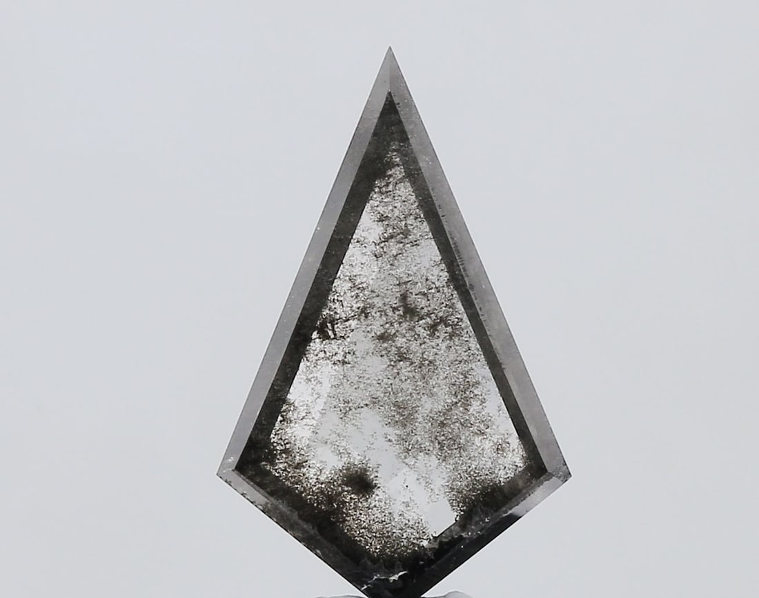 Loose Diamond - KITE 4.18ct Salt and Pepper I3: Loose Diamond - KITE 4.18ct Salt and Pepper I3 Source: This is a real non-mined Diamond that has been grown in a lab Shape: KITE Carats: 4.18 Color: Salt and Pepper Certification: NONE Video: