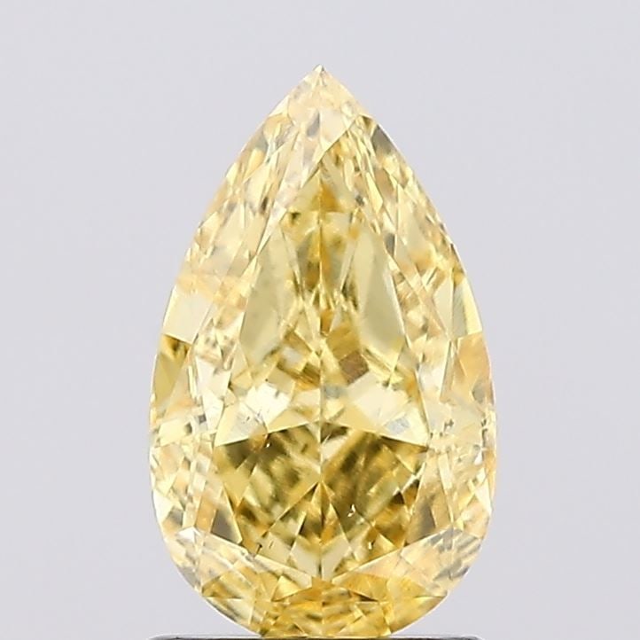 Loose Diamond - PEAR 1.35ct Fancy Vivid Yellow SI1: Loose Diamond - PEAR 1.35ct Fancy Vivid Yellow SI1 Source: This is a real non-mined Diamond that has been grown in a lab Shape: PEAR Carats: 1.35 Color: Fancy Vivid Yellow Certification: IGI Video: