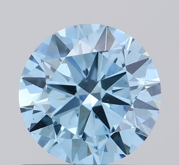 Loose Diamond - ROUND 0.83ct Fancy Vivid Blue VS1: Loose Diamond - ROUND 0.83ct Fancy Vivid Blue VS1 Source: This is a real non-mined Diamond that has been grown in a lab Shape: ROUND Carats: 0.83 Color: Fancy Vivid Blue Certification: IGI Video: