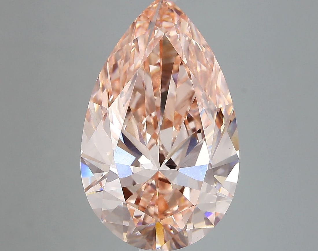 Loose Diamond - PEAR 6.74ct Fancy Vivid Pink VVS2: Loose Diamond - PEAR 6.74ct Fancy Vivid Pink VVS2 Source: This is a real non-mined Diamond that has been grown in a lab Shape: PEAR Carats: 6.74 Color: Fancy Vivid Pink Certification: IGI Video: