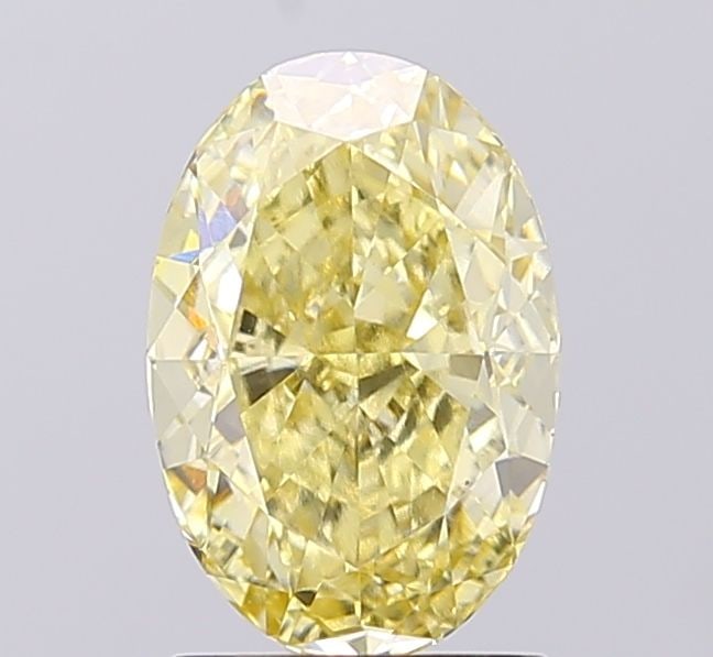 Loose Diamond - OVAL 2.1ct Fancy Yellow VS1: Loose Diamond - OVAL 2.1ct Fancy Yellow VS1 Source: This is a real non-mined Diamond that has been grown in a lab Shape: OVAL Carats: 2.1 Color: Fancy Yellow Certification: IGI Video:
