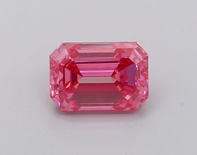 Loose Diamond - EMERALD 1.05ct Fancy Vivid Pink VVS2: Loose Diamond - EMERALD 1.05ct Fancy Vivid Pink VVS2 Source: This is a real non-mined Diamond that has been grown in a lab Shape: EMERALD Carats: 1.05 Color: Fancy Vivid Pink Certification: IGI Video:
