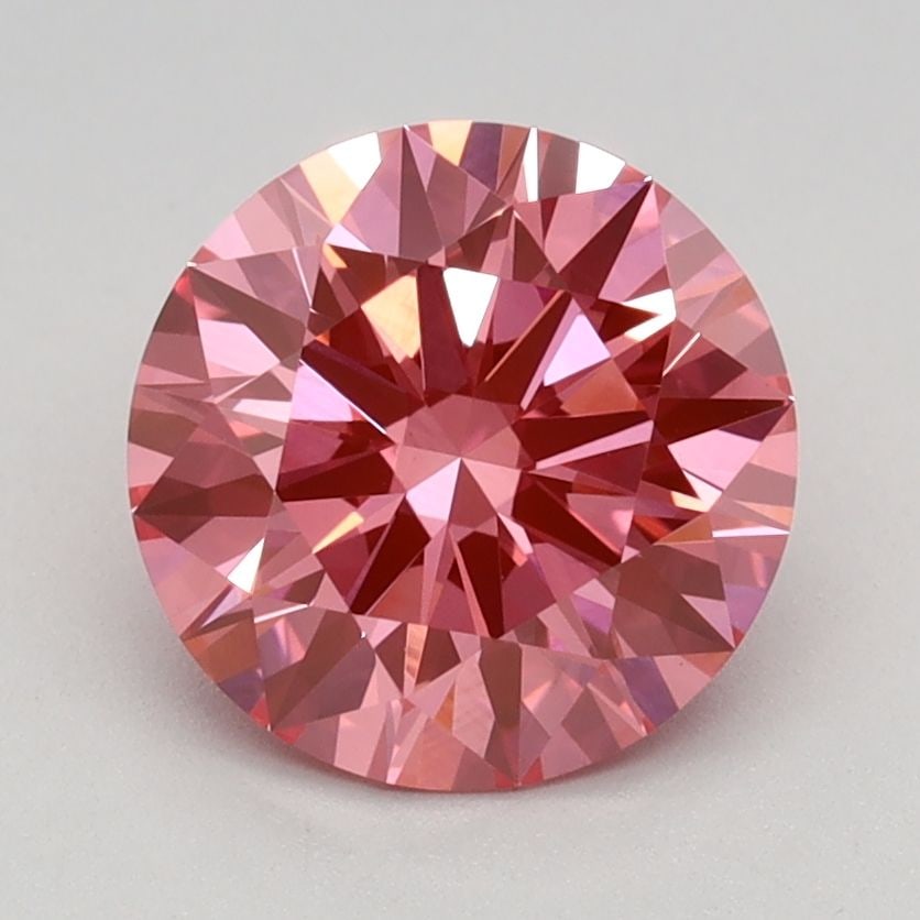Ideal Loose Diamond - ROUND 1.64ct Fancy Vivid Pink VS1: Ideal Loose Diamond - ROUND 1.64ct Fancy Vivid Pink VS1 Source: This is a real non-mined Diamond that has been grown in a lab Shape: ROUND Carats: 1.64 Color: Fancy Vivid Pink Certification: IGI Video