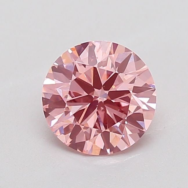 Loose Diamond - ROUND 1.01ct Fancy Vivid Pink VVS2: Loose Diamond - ROUND 1.01ct Fancy Vivid Pink VVS2 Source: This is a real non-mined Diamond that has been grown in a lab Shape: ROUND Carats: 1.01 Color: Fancy Vivid Pink Certification: NONE The Diamo