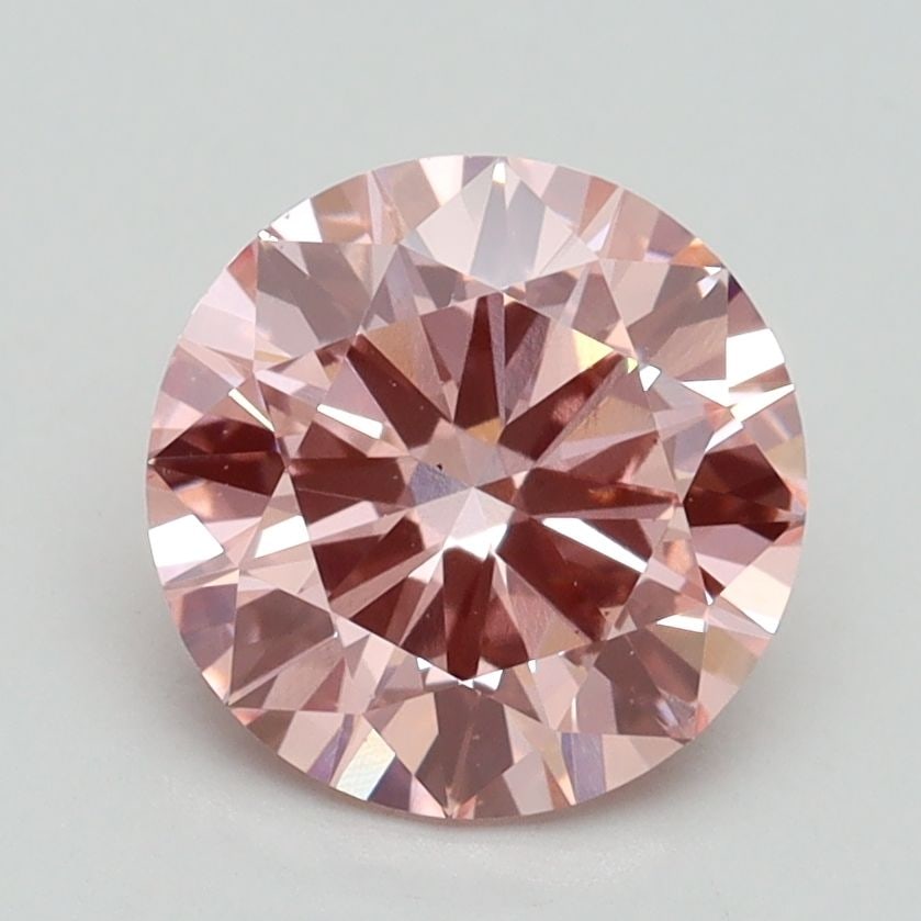 Loose Diamond - ROUND 1.9ct Fancy Vivid Pink VS1: Loose Diamond - ROUND 1.9ct Fancy Vivid Pink VS1 Source: This is a real non-mined Diamond that has been grown in a lab Shape: ROUND Carats: 1.9 Color: Fancy Vivid Pink Certification: IGI Video: