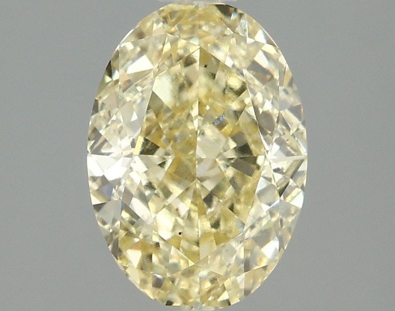 Loose Diamond - OVAL 2.09ct Fancy Intense Yellow VS1: Loose Diamond - OVAL 2.09ct Fancy Intense Yellow VS1 Source: This is a real non-mined Diamond that has been grown in a lab Shape: OVAL Carats: 2.09 Color: Fancy Intense Yellow Certification: IGI Video