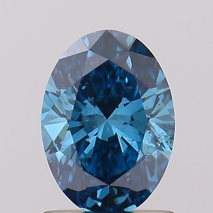 Loose Diamond - OVAL 0.89ct Fancy Vivid Blue SI2: Loose Diamond - OVAL 0.89ct Fancy Vivid Blue SI2 Source: This is a real non-mined Diamond that has been grown in a lab Shape: OVAL Carats: 0.89 Color: Fancy Vivid Blue Certification: NONE Video: