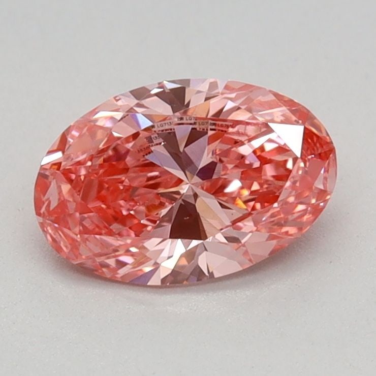 Loose Diamond - OVAL 0.61ct Fancy Vivid Pink VS1: Loose Diamond - OVAL 0.61ct Fancy Vivid Pink VS1 Source: This is a real non-mined Diamond that has been grown in a lab Shape: OVAL Carats: 0.61 Color: Fancy Vivid Pink Certification: IGI Video: