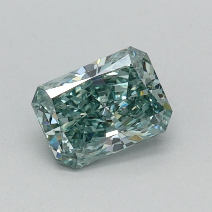 Loose Diamond - RADIANT 0.38ct Fancy Vivid Green VS1: Loose Diamond - RADIANT 0.38ct Fancy Vivid Green VS1 Source: This is a real non-mined Diamond that has been grown in a lab Shape: RADIANT Carats: 0.38 Color: Fancy Vivid Green Certification: IGI Video