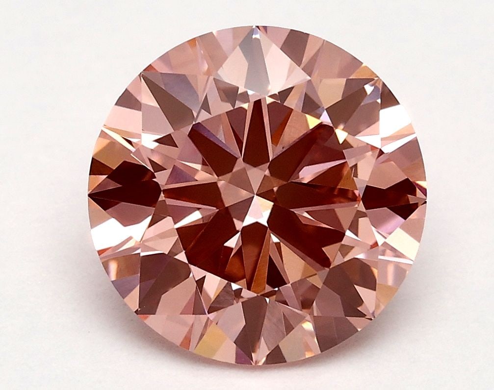 Loose Diamond - ROUND 2.11ct Fancy Vivid Pink VS1: Loose Diamond - ROUND 2.11ct Fancy Vivid Pink VS1 Source: This is a real non-mined Diamond that has been grown in a lab Shape: ROUND Carats: 2.11 Color: Fancy Vivid Pink Certification: IGI Video: