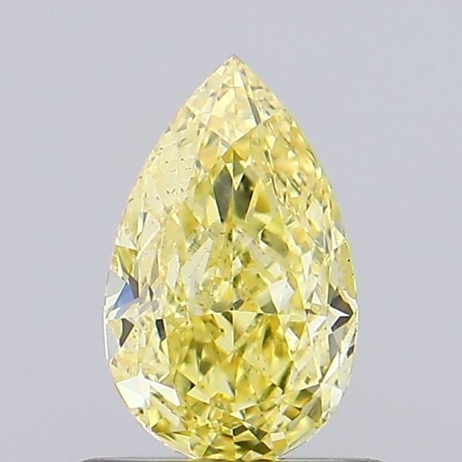 Loose Diamond - PEAR 0.72ct Fancy Vivid Yellow SI2: Loose Diamond - PEAR 0.72ct Fancy Vivid Yellow SI2 Source: This is a real non-mined Diamond that has been grown in a lab Shape: PEAR Carats: 0.72 Color: Fancy Vivid Yellow Certification: IGI Video: