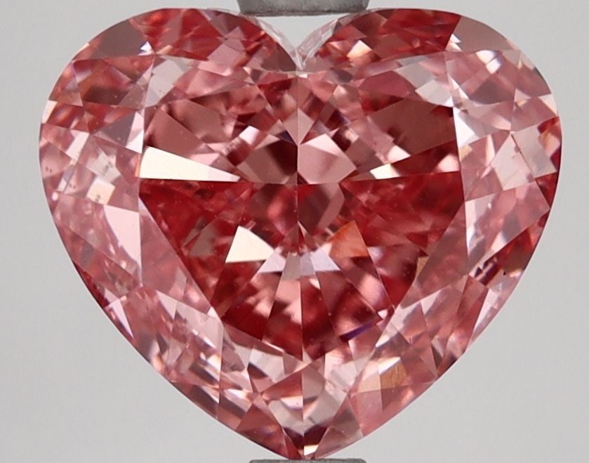 Loose Diamond - HEART 3.0ct Fancy Vivid Pink VS1: Loose Diamond - HEART 3.0ct Fancy Vivid Pink VS1 Source: This is a real non-mined Diamond that has been grown in a lab Shape: HEART Carats: 3.0 Color: Fancy Vivid Pink Certification: IGI Video: