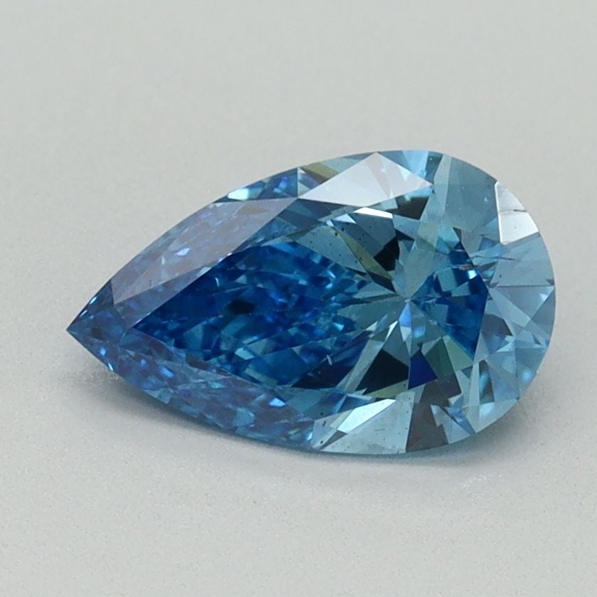 Loose Diamond - PEAR 1.0ct Fancy Vivid Blue SI1: Loose Diamond - PEAR 1.0ct Fancy Vivid Blue SI1 Source: This is a real non-mined Diamond that has been grown in a lab Shape: PEAR Carats: 1.0 Color: Fancy Vivid Blue Certification: IGI Video: