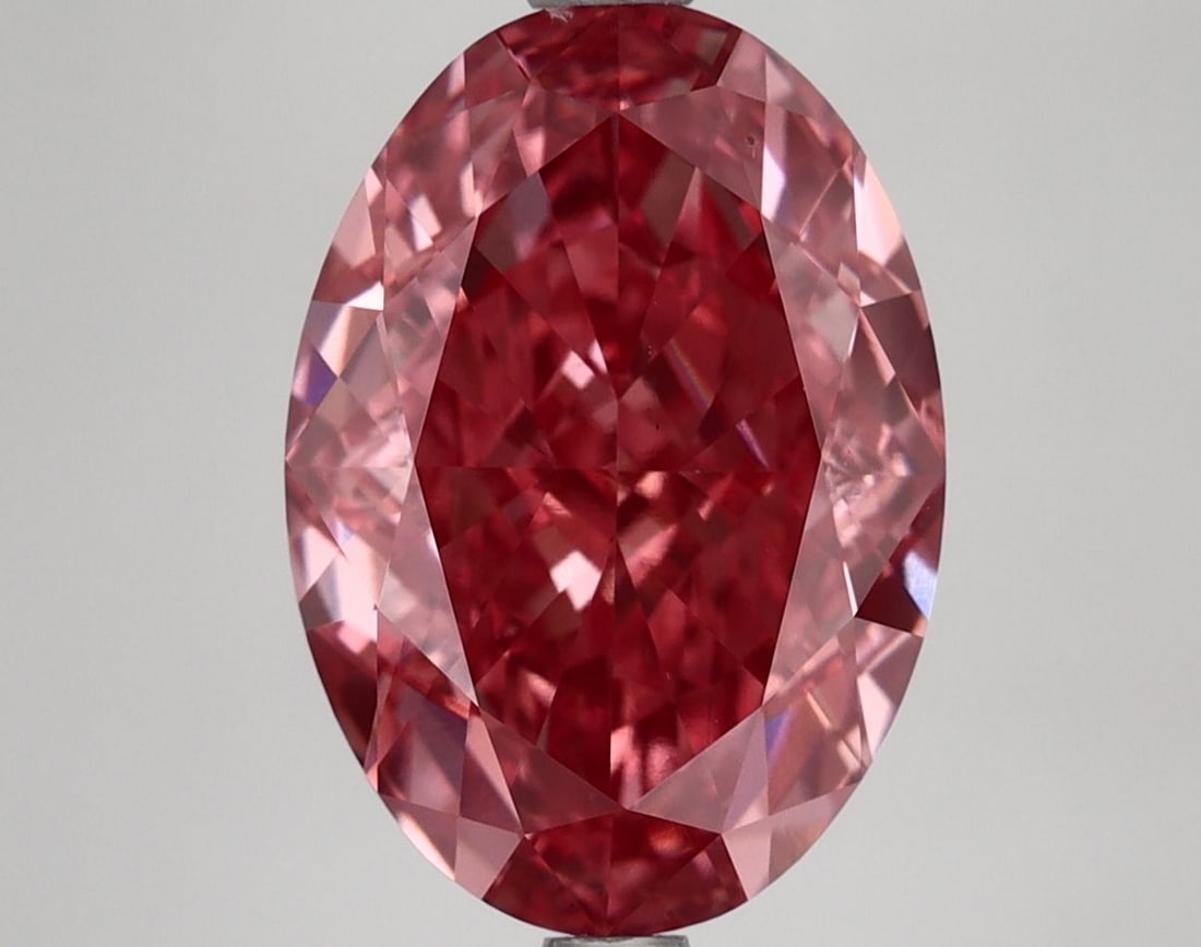 Loose Diamond - OVAL 5.14ct Fancy Vivid Pink VS1: Loose Diamond - OVAL 5.14ct Fancy Vivid Pink VS1 Source: This is a real non-mined Diamond that has been grown in a lab Shape: OVAL Carats: 5.14 Color: Fancy Vivid Pink Certification: IGI Video: