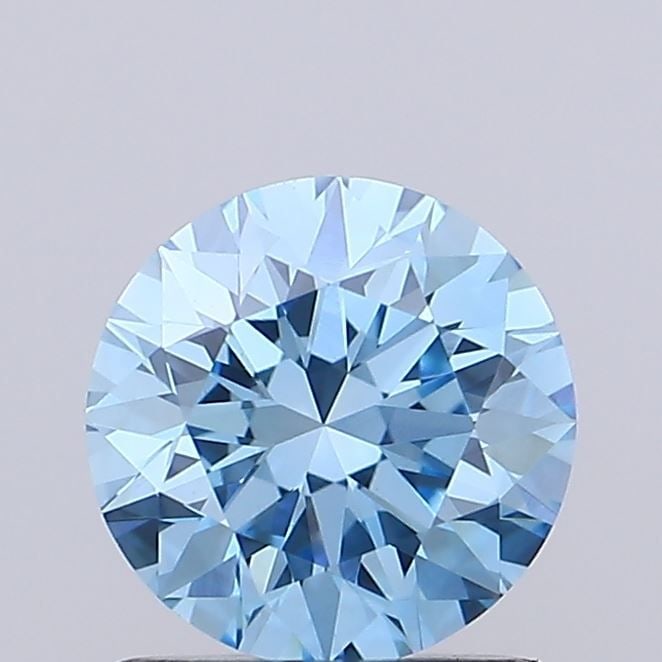 Loose Diamond - ROUND 0.72ct Fancy Vivid Blue VVS2: Loose Diamond - ROUND 0.72ct Fancy Vivid Blue VVS2 Source: This is a real non-mined Diamond that has been grown in a lab Shape: ROUND Carats: 0.72 Color: Fancy Vivid Blue Certification: IGI Video:
