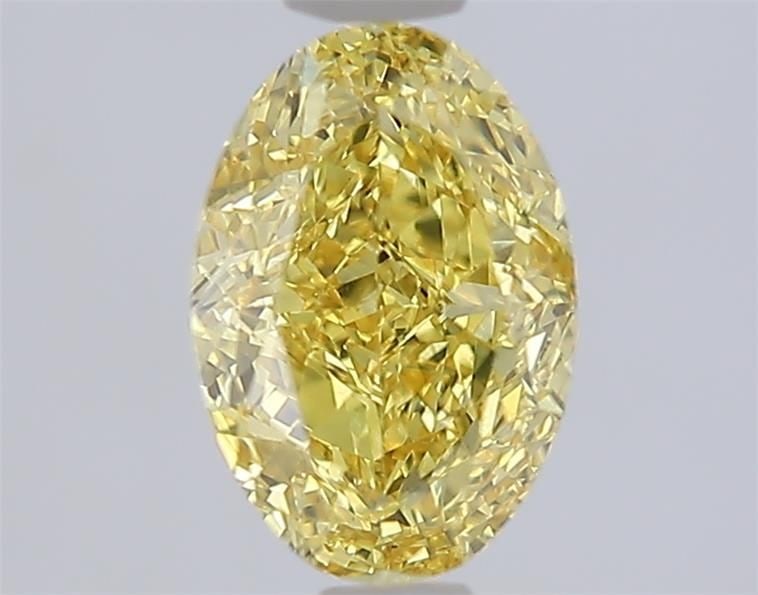 Loose Diamond - OVAL 1.6ct Fancy Vivid Yellow VS1: Loose Diamond - OVAL 1.6ct Fancy Vivid Yellow VS1 Source: This is a real non-mined Diamond that has been grown in a lab Shape: OVAL Carats: 1.6 Color: Fancy Vivid Yellow Certification: IGI Video: