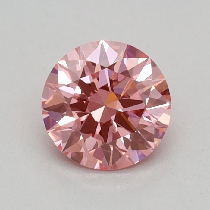 Loose Diamond - ROUND 0.36ct Fancy Vivid Pink VS1: Loose Diamond - ROUND 0.36ct Fancy Vivid Pink VS1 Source: This is a real non-mined Diamond that has been grown in a lab Shape: ROUND Carats: 0.36 Color: Fancy Vivid Pink Certification: IGI Video: