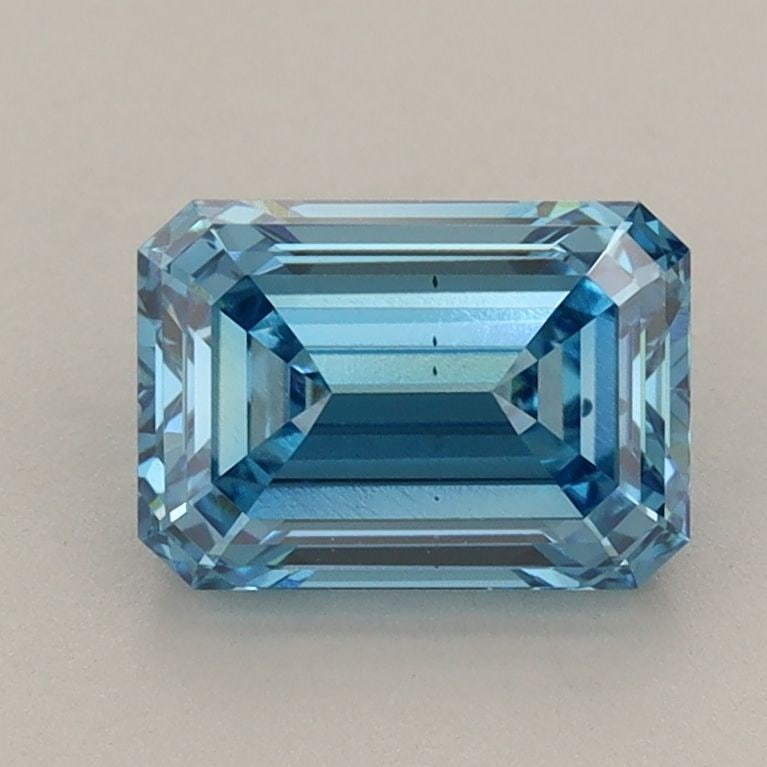 Loose Diamond - EMERALD 1.55ct Fancy Vivid Blue VS2: Loose Diamond - EMERALD 1.55ct Fancy Vivid Blue VS2 Source: This is a real non-mined Diamond that has been grown in a lab Shape: EMERALD Carats: 1.55 Color: Fancy Vivid Blue Certification: IGI Video: