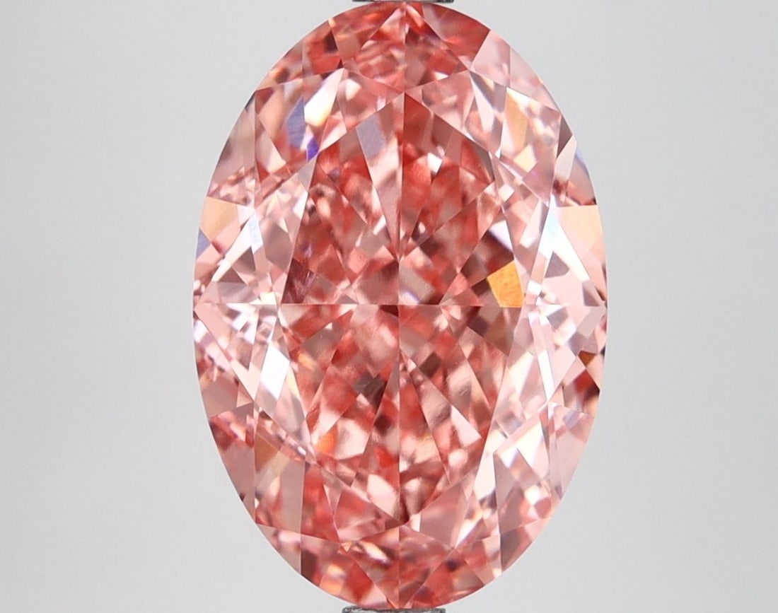 Loose Diamond - OVAL 4.63ct Fancy Vivid Pink VVS2: Loose Diamond - OVAL 4.63ct Fancy Vivid Pink VVS2 Source: This is a real non-mined Diamond that has been grown in a lab Shape: OVAL Carats: 4.63 Color: Fancy Vivid Pink Certification: IGI Video: